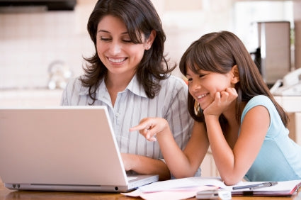 Mom and daughter on Pinterest on laptop