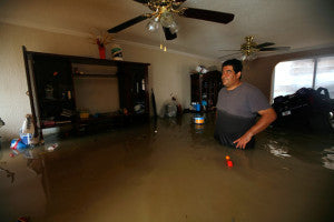 Flooded House via Telegraph - Texas