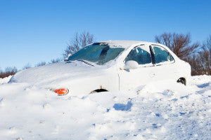 Car Stuck in Snow off a Road Winter Survival