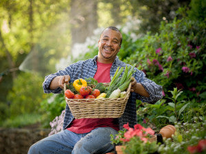 Happy man amidst vegetable shortage