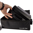 Hand placing items into the Vesta Carrying Case by InstaFire