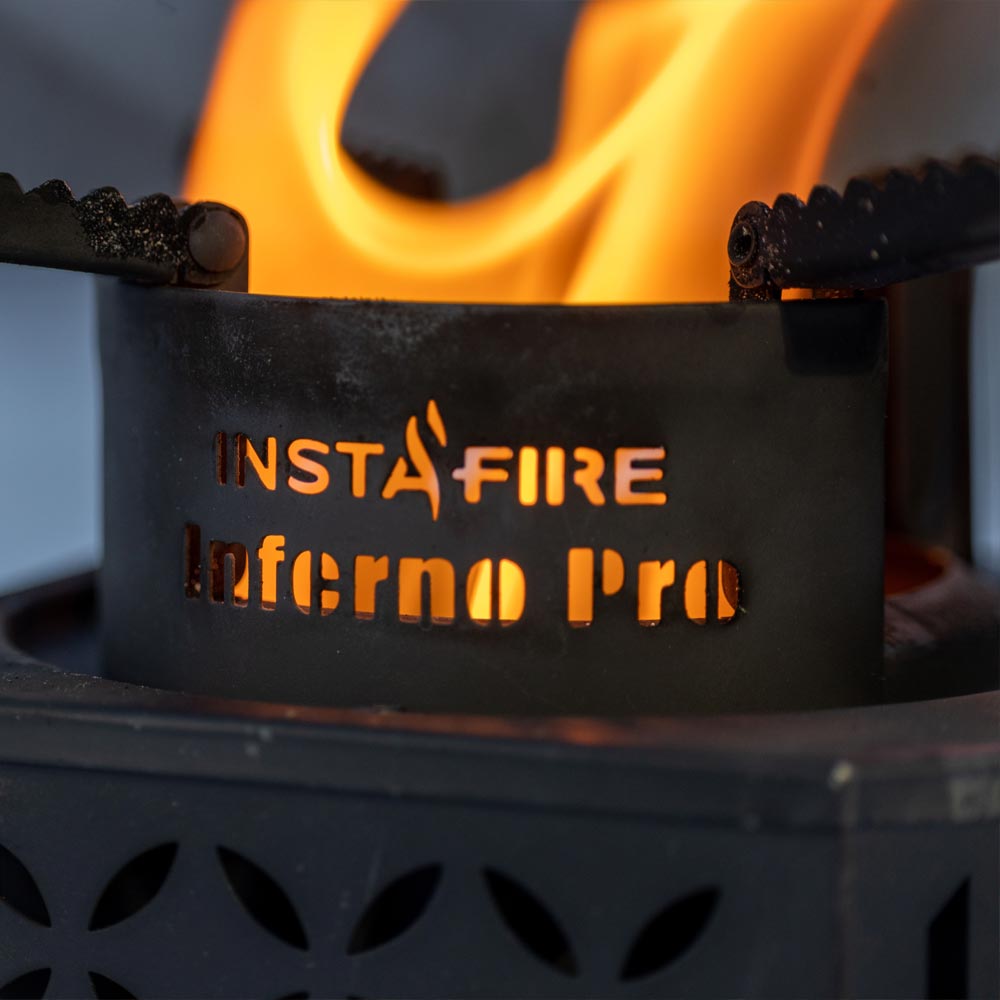 Close up on InstaFire Inferno Pro Outdoor Biomass Stove logo with flame behind